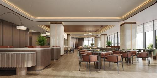 a rendering of a restaurant with tables and chairs at Hilton Garden Inn Jingzhou Shashi in Jingzhou