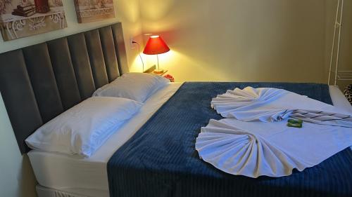 Katil atau katil-katil dalam bilik di Chalé 3 vista para montanha