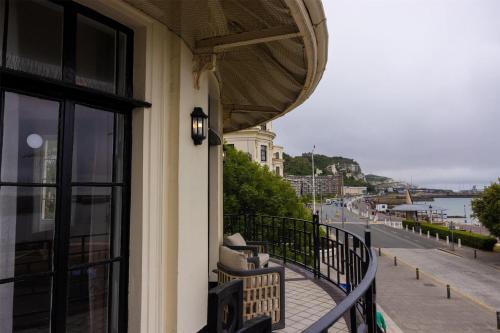 a balcony of a building with a view of a street at Dover Marina Hotel & Spa, Tapestry Collection by Hilton in Dover
