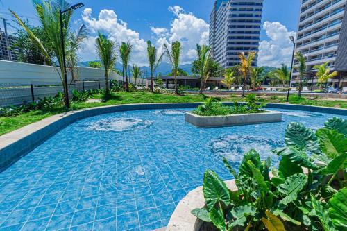 Kolam renang di atau dekat dengan Apartasuite con vista al mar y acceso a la playa