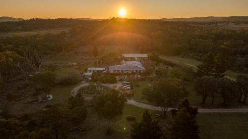 an aerial view of a house with the sunset in the background at Sabo’s On Severn in Fletcher