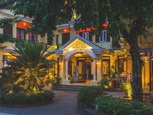 a building with a sign that reads amagine heritage center at ANNAM HERITAGE - Thuy Duong 3 in Hoi An