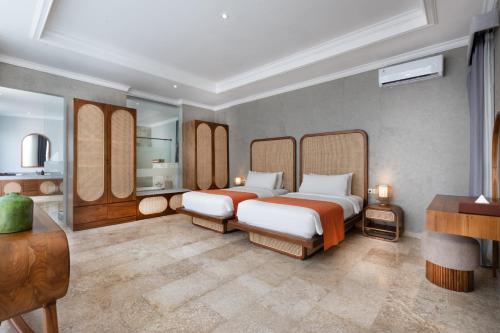 Кровать или кровати в номере Nunamkhalu Private Villa and Spa