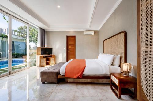 Кровать или кровати в номере Nunamkhalu Private Villa and Spa
