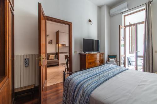 Postel nebo postele na pokoji v ubytování Casetta Stella - Affitti Brevi Italia