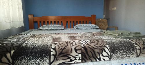 Postel nebo postele na pokoji v ubytování Prema Hme Stay