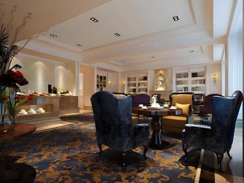 a dining room with a table and chairs at Zhejiang D.H Hotel in Jiaxing