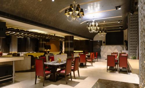 Ein Sitzbereich in der Unterkunft Udman Hotel Chhattarpur