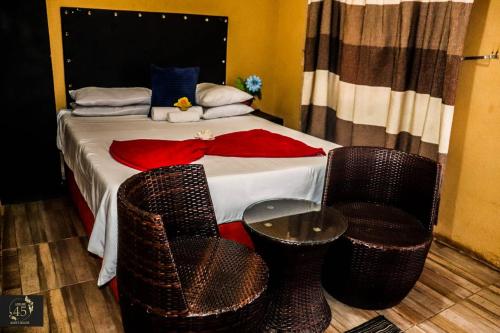 Ένα ή περισσότερα κρεβάτια σε δωμάτιο στο Leisure 45 Guest House
