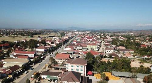 an aerial view of a small town with buildings at Favanhmai Hotel in Muang Phônsavan