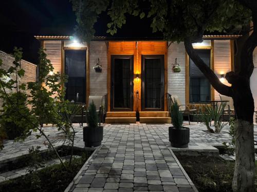 a front door of a house at night at Dream House in Yerevan