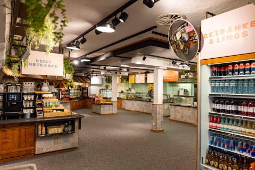 a grocery store aisle with a lot of products at Berghotel Trübsee - Accessible Only by Cable Car in Engelberg