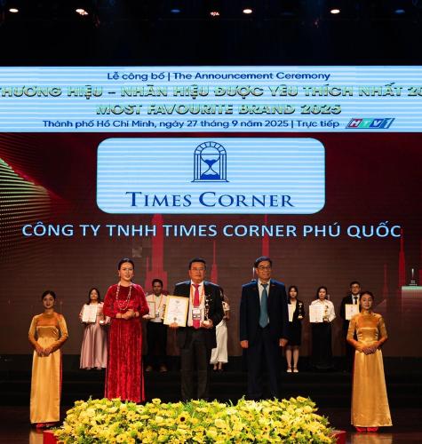 a group of people standing on a stage at Times Corner Amalfi Hotel in Phú Quốc