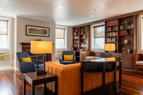 a living room with a couch and chairs at Comfort Inn Rockland - Boston in Rockland