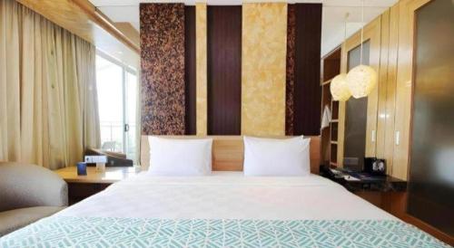 Una cama o camas en una habitación de The Rinra