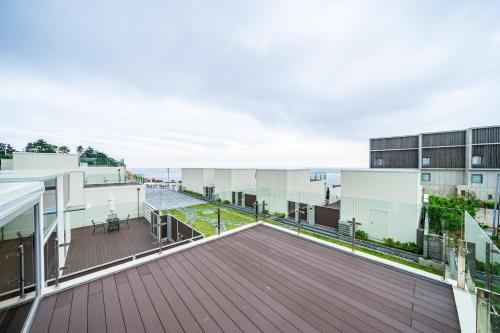 a view of the balcony of a building at Ocean Bliss in Ulsan