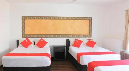 Postel nebo postele na pokoji v ubytování OYO Hotel Plata,Fresnillo, Zacatecas