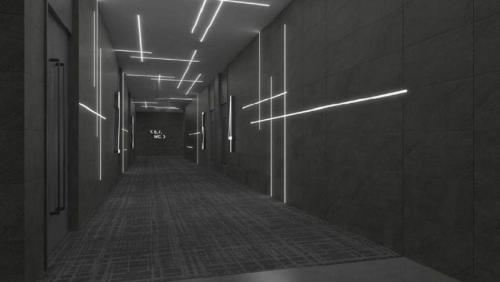 an empty hallway with a long hallway with lights at Taiyi International Hotel in Wenzhou