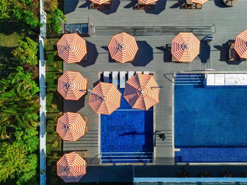 a group of umbrellas on the side of a building at Hilton Fiji Beach Resort and Spa in Denarau