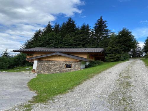 a building on the side of a dirt road at Chalet in Flachau near Ski Slopes in Flachau
