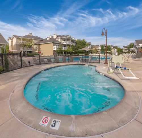 a large swimming pool with blue water at WorldMark Windsor in Windsor