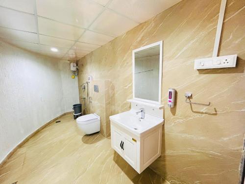 Et badeværelse på Aaryans rieverwood resort