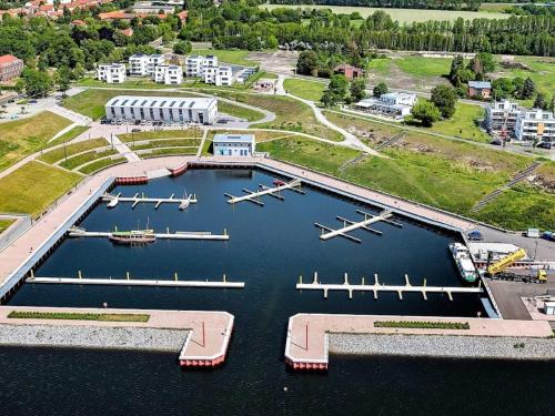 an aerial view of a marina with boats in the water at Ferienwohnung Penthaus ILSE in Großräschen