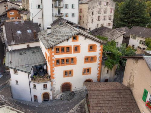 an overhead view of a building in a city at Cricerhaus in Visp