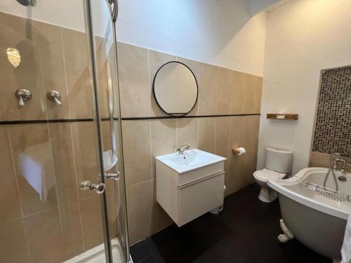 Koupelna v ubytování Ouwerf Guesthouse