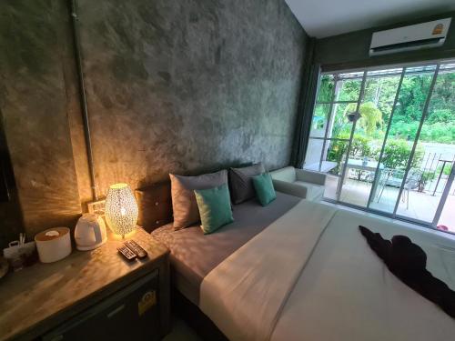 Katil atau katil-katil dalam bilik di Samed Your House