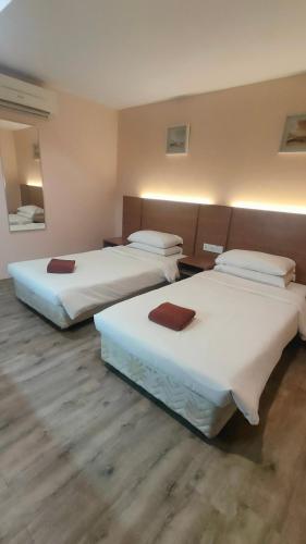 Postel nebo postele na pokoji v ubytování Walk Inn