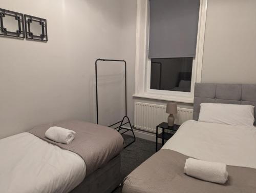 Postel nebo postele na pokoji v ubytování Jesmond 3 Bed