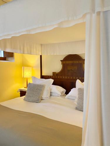 Postel nebo postele na pokoji v ubytování Son Gener Hotel Spa
