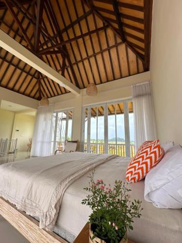 Postel nebo postele na pokoji v ubytování The Casa Kirana