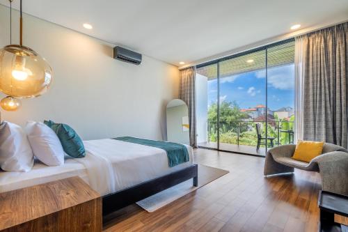 a bedroom with a bed and a large window at Serenity Luxury Smart Villas with Private Pool, Canggu in Dalung