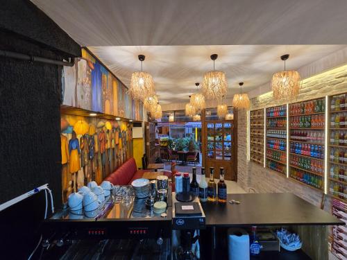 a bar in a restaurant with bottles of wine at MorAgop Suites in Istanbul