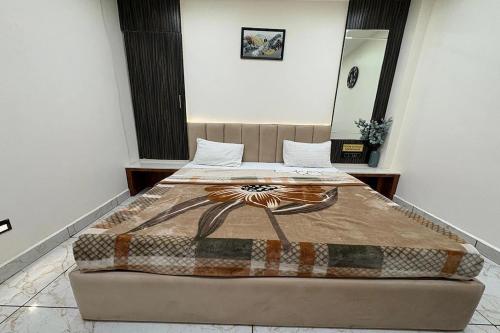 Hotel Anantshreeにあるベッド