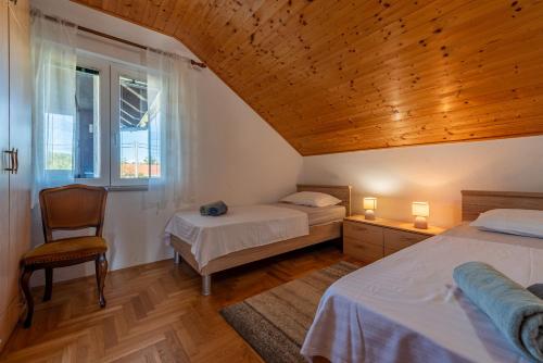 Postel nebo postele na pokoji v ubytování Villa Chervil ZadarVillas