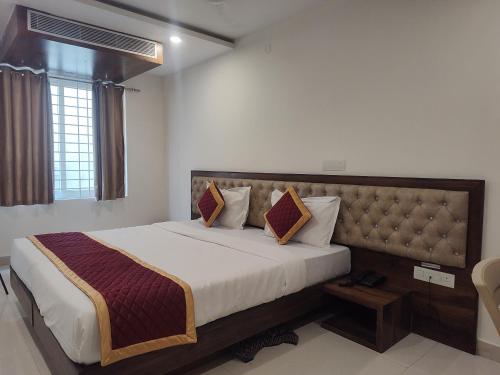 Ένα ή περισσότερα κρεβάτια σε δωμάτιο στο Swagath Inn, Brookefield