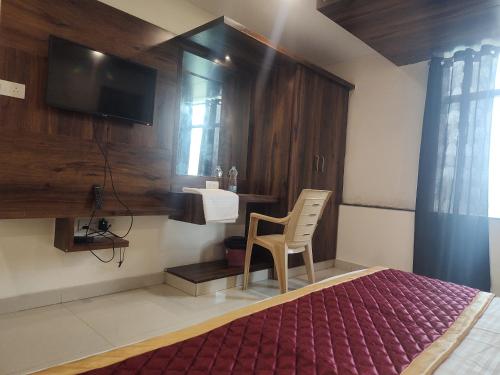 Μια τηλεόραση ή/και κέντρο ψυχαγωγίας στο Swagath Inn, Brookefield