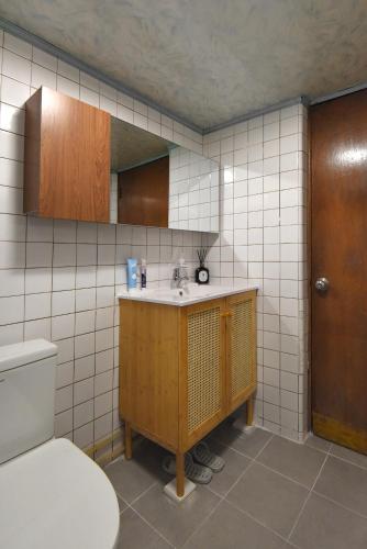 a bathroom with a sink and a toilet at 가나다스테이 GaNaDaStay ,Busan, Gwangalli-Beach #광안역 6번출구 8분거리#광안해수욕장 15분 #단체8인숙소 in Busan