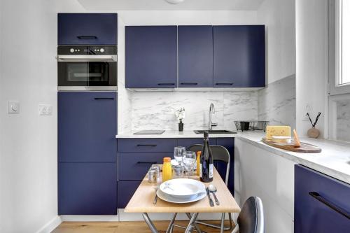 Η κουζίνα ή μικρή κουζίνα στο TBS 339 - Cosy Apartment in Vincennes