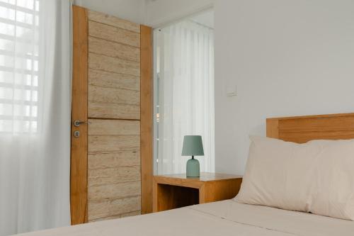 Postel nebo postele na pokoji v ubytování Serenity
