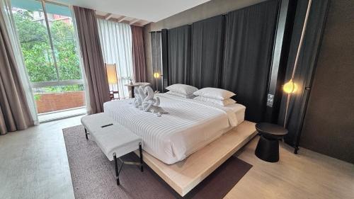 Cama o camas de una habitación en Grand Vista Hotel Chiangrai