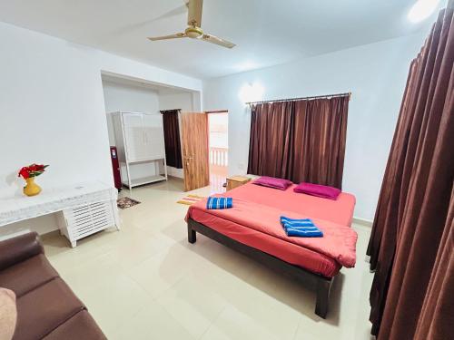 Ένα ή περισσότερα κρεβάτια σε δωμάτιο στο Fatima's Guesthouse