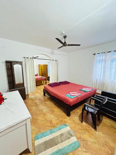 Ένα ή περισσότερα κρεβάτια σε δωμάτιο στο Fatima's Guesthouse