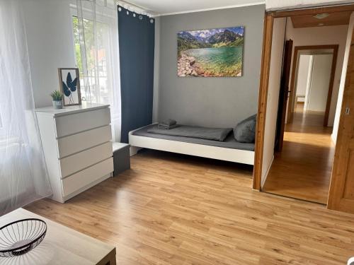 Ένα ή περισσότερα κρεβάτια σε δωμάτιο στο Appartement "Tom" mit 3 Schlafzimmern und Parkplatz