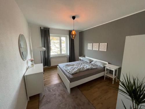 Ένα ή περισσότερα κρεβάτια σε δωμάτιο στο Appartement "Johanna" mit 3 Schlafzimmern