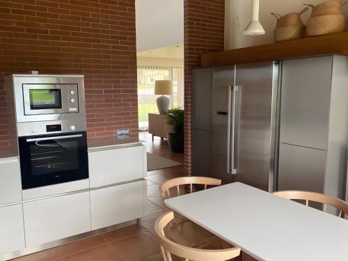 Dapur atau dapur kecil di Villa Monasterio