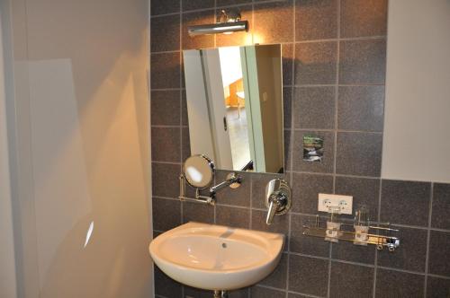 Seminarhotel in der Manfred-Sauer-Stiftungにあるバスルーム